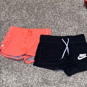 Orange Under Armour short and black Nike short